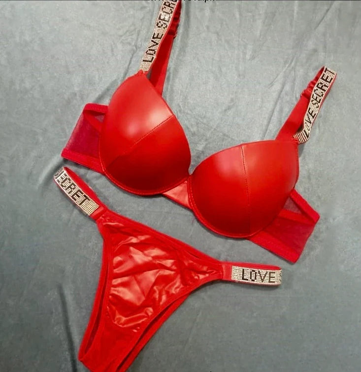 Red Love Secret lingerie set on a gray background