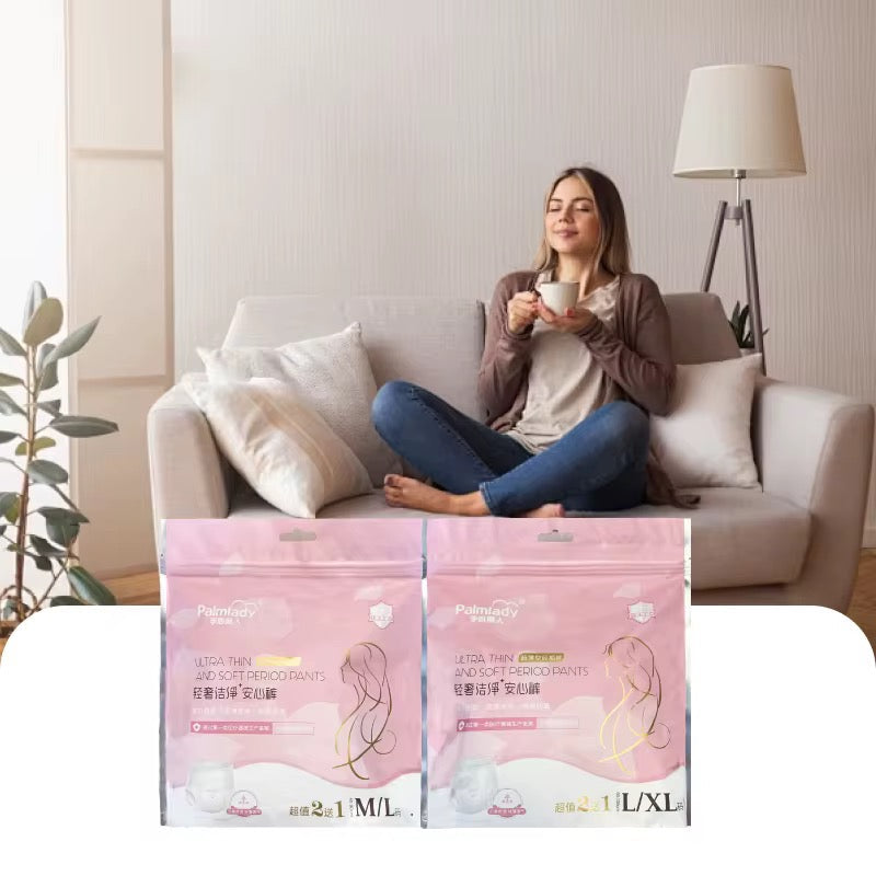 Woman sitting on a couch holding a cup with two boxes of Pantyline products in the foreground.