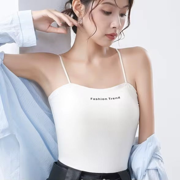 Woman wearing a white 'Fashion Trend' top with a light blue fabric draped over her shoulder.