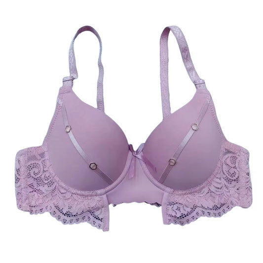 Purple bra with lace details on a white background