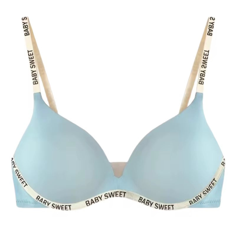 Light blue bra with 'Baby Sweet' lettering on straps against a white background