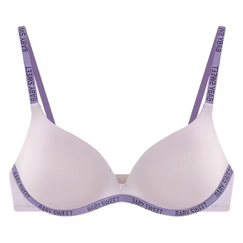 White bra with purple straps and 'Baby Sweet' branding on a white background