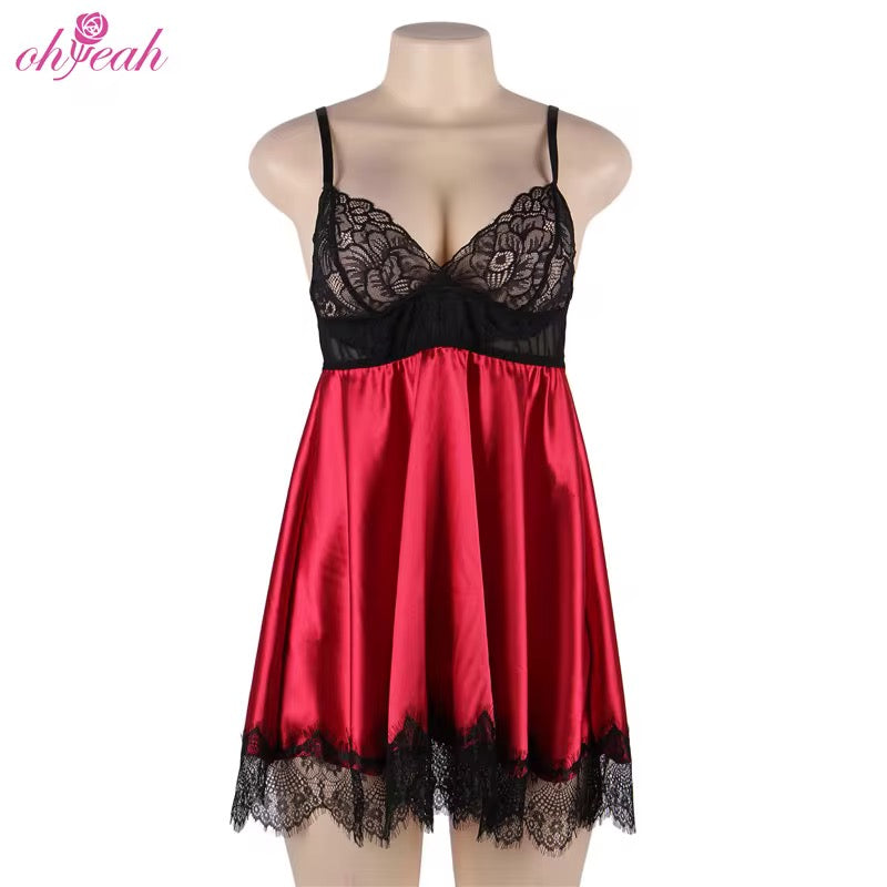 Red satin nightgown with black lace details on a mannequin against a white background.