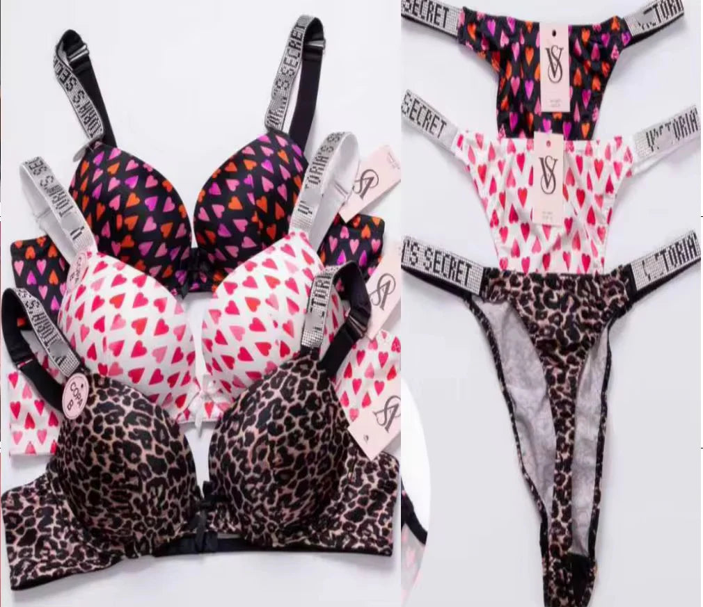 Victoria's Secret lingerie set with leopard print, heart pattern, and solid colors on a white background.