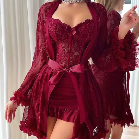 Red lace lingerie set with matching robe against a neutral background