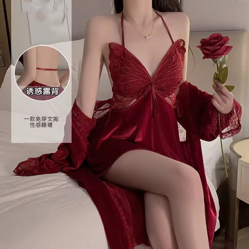 Woman in a red dress holding a rose on a bed, with close-up inset showing details.
