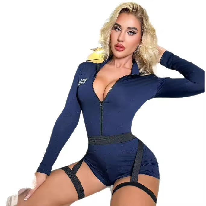 Woman wearing a blue jumpsuit with a high neckline and suspenders on a white background