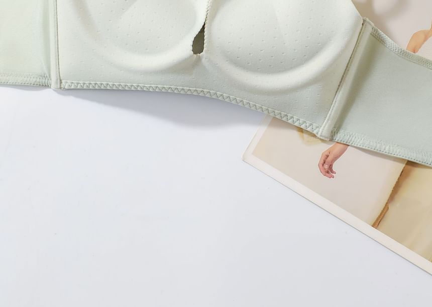 Green waist trainer on a white background